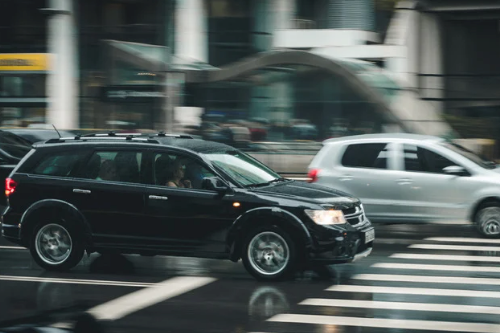 City Traffic crossing into pedestrian walkway